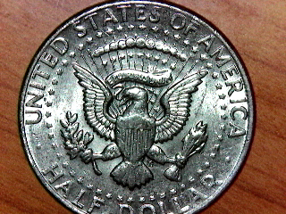 Kennedy-Half-With-Doubling-Letters-On-Half-Dollar-On-Reverse